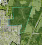 Aerial view of a map showing a delineated area with cyan lines over Newton Dairy Road, Henderson NC, featuring a mixed landscape of agricultural fields, wooded areas, and a residential neighborhood.