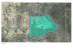 Aerial map of a 53.2 Acs section near Finch Road in Henderson NC, highlighting land parcels with a prominent turquoise-colored body of water located centrally.