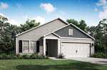 Nestled at 107 Long Green Way in Oxford, this modern, single-story house boasts light gray siding and dark gray accents. It features a two-car garage with a white door, a quaint front porch, and a landscaped yard adorned with green shrubs and flowers under the clear blue sky.