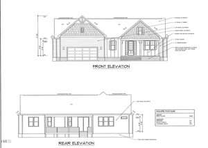Architectural blueprint for 503 Forest Road, Oxford, depicting front and rear elevations of a house. The front view boasts a garage with a gabled roof, while the rear features a central door flanked by windows. Dimensions and material notes are detailed on both elevations.