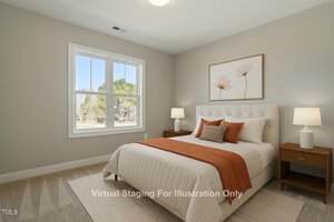 A bedroom with a bed featuring white and orange bedding, two wooden nightstands with lamps, and a nature-themed framed print above the headboard. A large window on the left lets in natural light. Text on the image reads, "Virtual Staging For Illustration Only.