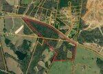 Aerial map view of a large, irregularly shaped plot outlined in red near 00 Cheeks Quarter Road, Henderson, bordered by roads and properties with yellow boundary lines. The area includes fields, wooded sections, and scattered buildings.