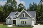 A two-story gray house with white trim and a dark gray roof sits on a landscaped lot at 1224 Red Cedar Court in Youngsville, surrounded by tall trees and green grass under a partly cloudy sky.