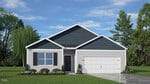 Single-story suburban house at 118 Ross Drive with dark blue siding on the gable, light-colored horizontal stem siding below, a black front door, double garage, landscaped yard with shrubs and grass, set against a backdrop of trees.