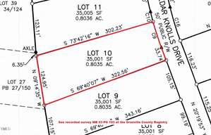 A black-and-white property survey map shows Lot 10, outlined in red, measuring 35,001 sq. ft. (0.8035 acres), with adjacent lots labeled and boundary dimensions provided. Nearby streets are marked.