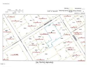 A rotated map of Granville County, NC, showing outlined property boundaries, parcel numbers, and addresses. One parcel is highlighted in blue among neighboring lots. The map includes a legend for symbols and labels.