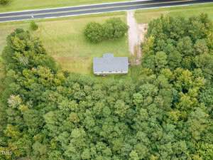A house surrounded by trees.