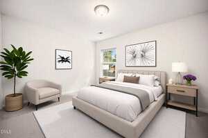 A modern bedroom with a beige upholstered bed, two nightstands with lamps, a potted plant, a beige armchair, two black-and-white artworks on the walls, and a window letting in natural light.
