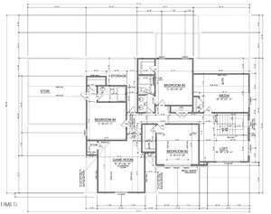 Architectural floor plan showing the layout of a house's upper level, labeled with rooms including bedrooms, bathrooms, storage, loft, media room, and game room, with measurements and door placements indicated.