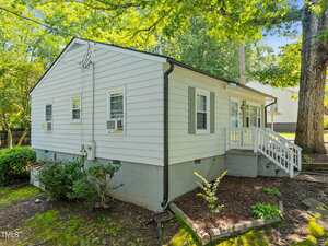 A house with a white staircase.