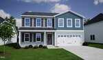 Charming two-story suburban house at 40 Buckthorn Drive, Youngsville, featuring blue and white siding, large windows, a dark front door, and an attached two-car garage. The home sits on a green lawn with small shrubs under a partly cloudy sky.