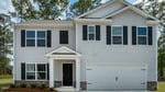 A two-story modern house at 106 Ross Drive with light gray siding, black shutters, a covered entryway, and a double garage door. The home is surrounded by grass, small shrubs, tall trees in the background, and features clean architectural STEM lines.