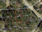 Aerial view of wooded residential lots bordered by roads, with property boundaries and parcel numbers marked. One central lot is outlined in orange with its dimensions labeled as 178.3 feet by 84.20 feet.