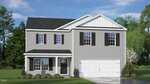 A two-story gray house with white trim, black shutters, and a front porch sits on a green lawn with shrubs and flowers, a double garage, and trees in the background under a blue sky.