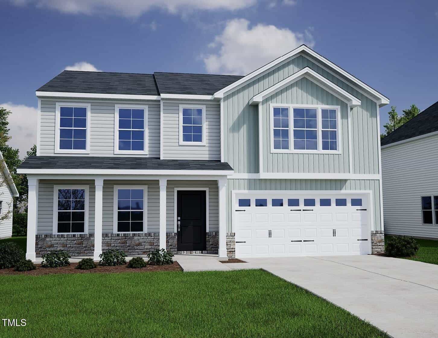 A two-story modern suburban house with white siding, large front windows, a covered porch, and a double garage. The front yard has green grass, small shrubs, and a concrete driveway.