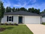A single-story house at 400 Purple Aster Street, Youngsville, features light gray siding, black shutters, a dark gray roof, a blue front door, and a white two-car garage. The small front yard includes green grass, shrubs, and a tree.