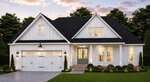 A white single-story house with a black roof, double garage doors, front porch with columns, green front door, and lit windows sits beautifully at 109 Spring Grove Drive in Oxford. The yard is landscaped with grass, bushes, and flowers. Trees and a cloudy sky are in the background.