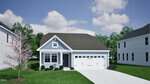 Charming single-story light blue house with gable roof, attached two-car garage, front porch, and white trim located in Youngsville at 245 Buckthorn Drive. A driveway leads to the garage. The yard features green grass, a small blooming tree, and is surrounded by other houses and trees.