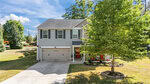 Two-story gray house with white trim, double garage, and front porch located at 29 W Waycliff Road in Henderson. A large green tree is in the front yard, and the driveway leads to the garage. The lawn is mowed, and the sky is mostly clear with some clouds.