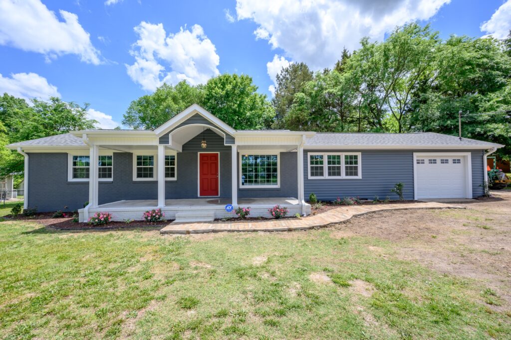 A home we sold: a brick ranch with a red front door