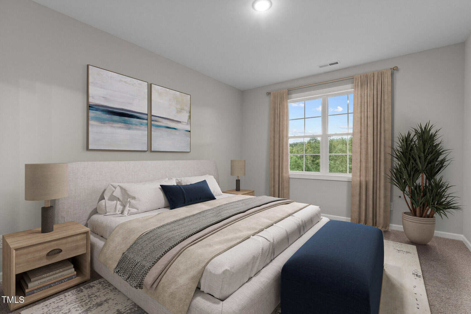 A bedroom with a neatly made bed, two nightstands with lamps, abstract artwork above the bed, a window with beige curtains, a large potted plant, and light-colored walls and carpet.
