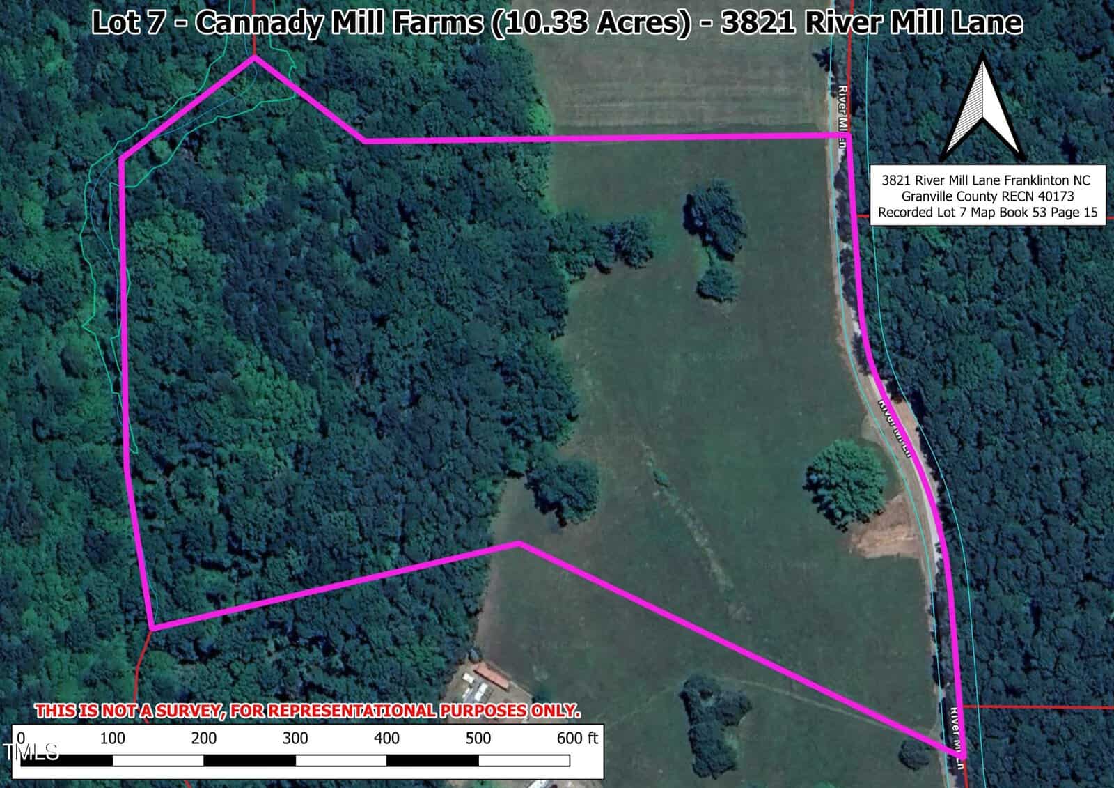Aerial view of Lot 7 at Cannady Mill Farms in Franklinton, outlined in pink. This 10.33-acre lot at 3821 River Mill Lane offers a blend of wooded and open land, bordered by a road on the right side. Note, the image is not for official purposes.