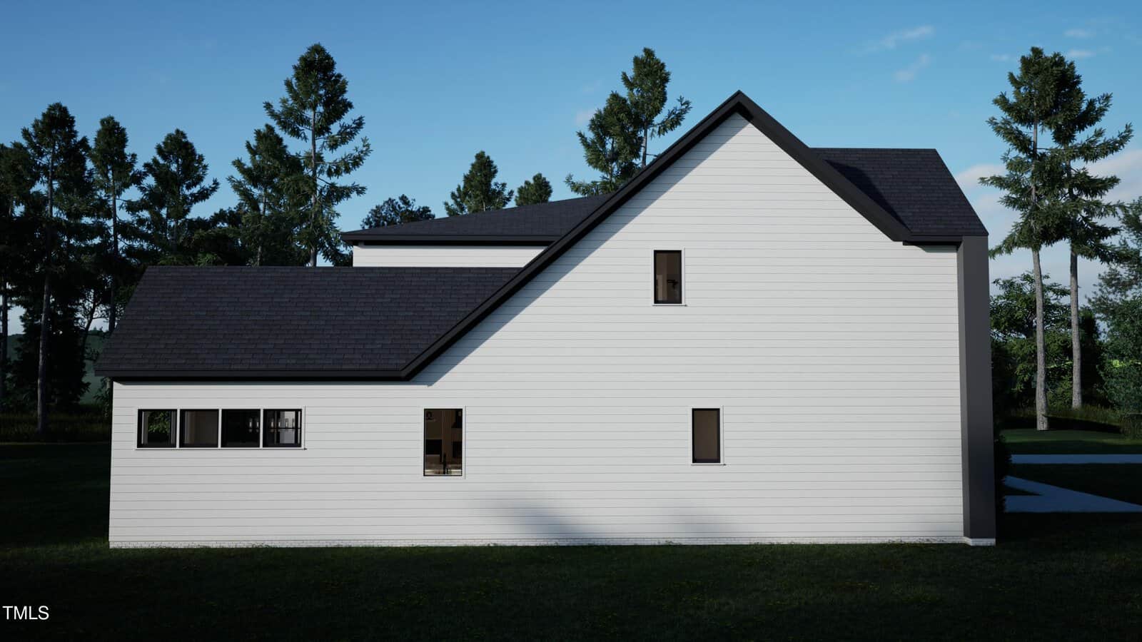 A modern white house with dark roof shingles, several rectangular windows, and clean lines stands on a grassy lawn with tall trees and a clear blue sky in the background.