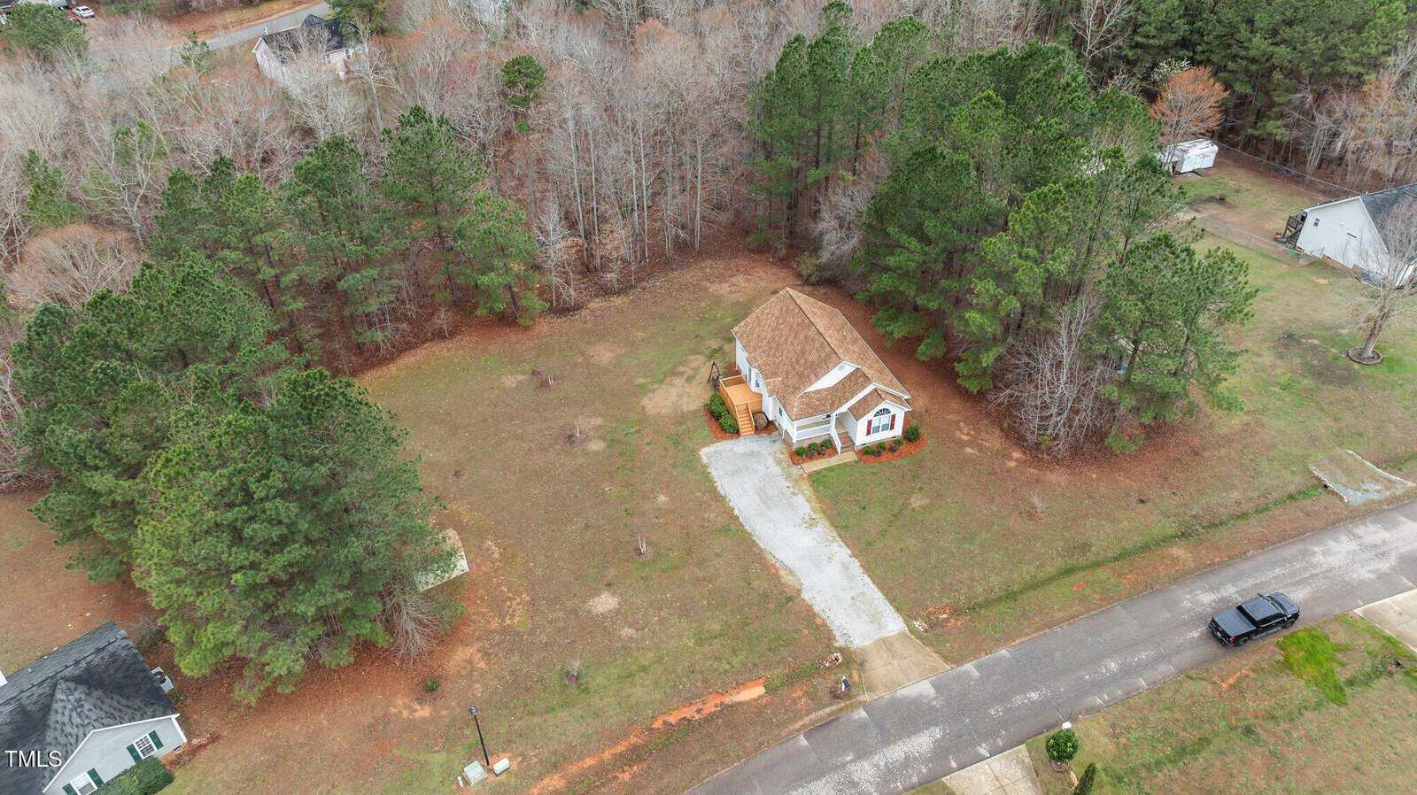 A house surrounded by trees.