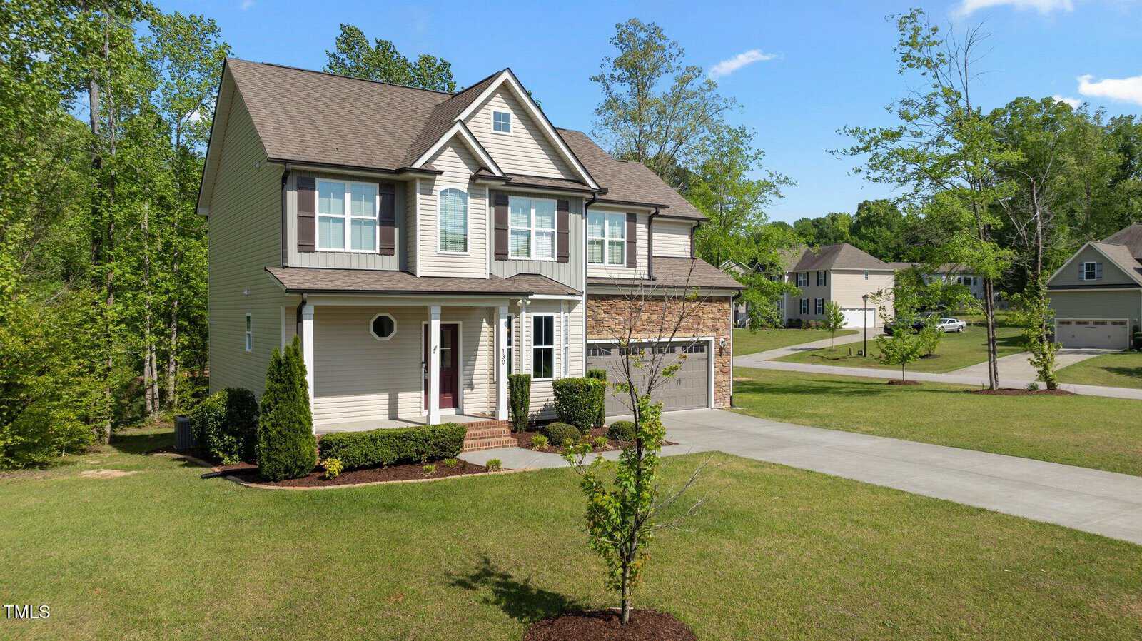 A house with a driveway and a driveway.