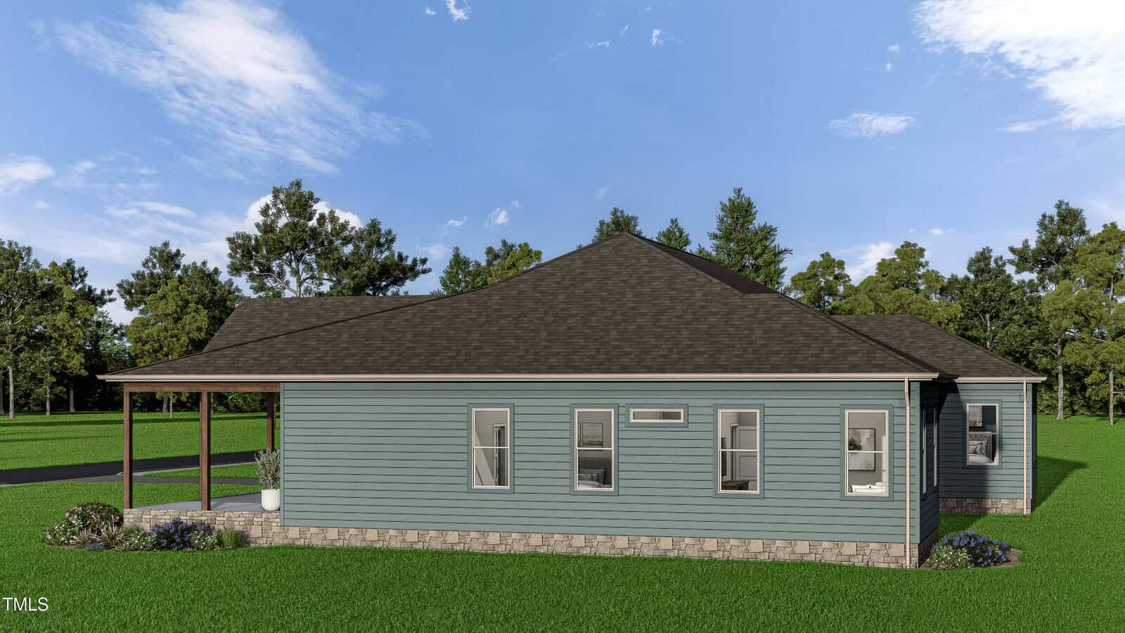 A single-story house with blue-gray siding, several rectangular windows, a dark roof, and a covered porch sits on a grassy lawn, surrounded by trees under a partly cloudy sky.