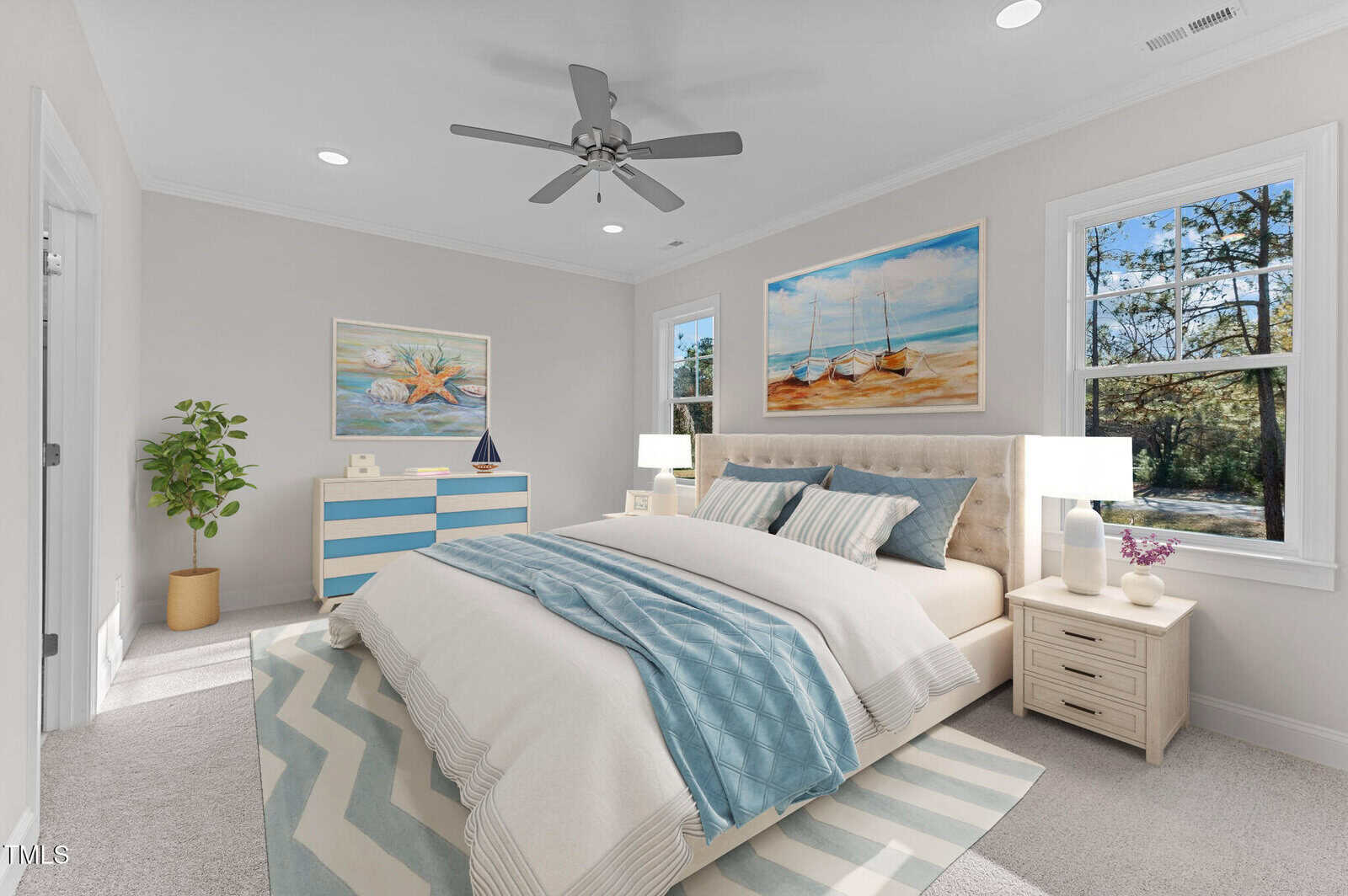 A bright, modern bedroom with large windows, a beige bed with blue and white bedding, two nightstands, a blue-striped dresser, two paintings, and a potted plant. Natural light fills the room.