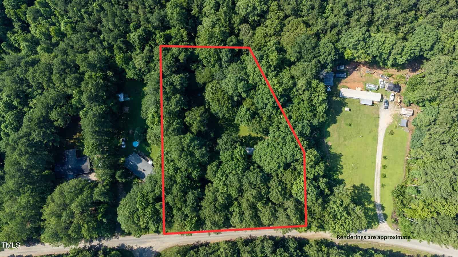 Aerial view of a wooded area outlined in red, showing dense green trees with a road at the bottom and a few buildings visible near the right and left edges of the image. Text in the corner reads "Renderings are approximate.