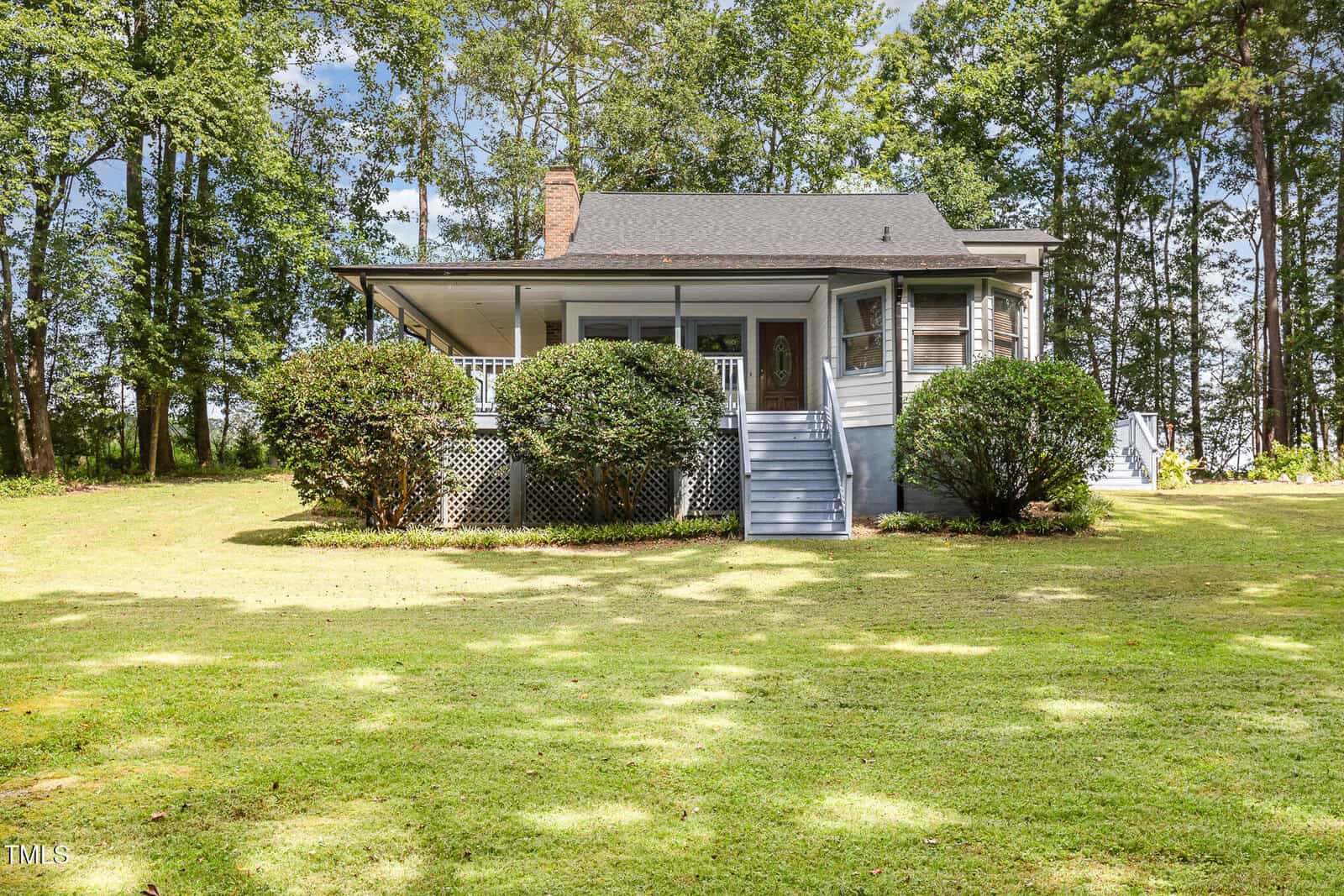 A house with a yard and trees.