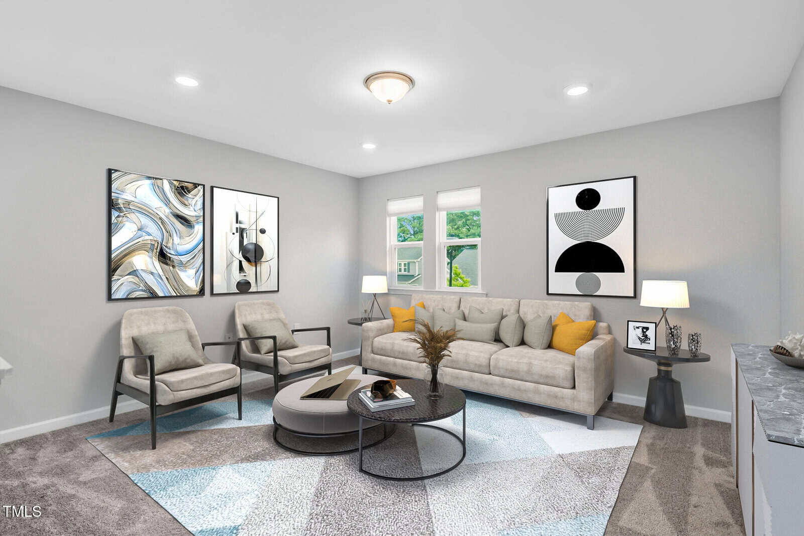 A modern living room with a beige sofa, two gray armchairs, abstract art on gray walls, round coffee tables, and large windows letting in natural light. Neutral tones and geometric rug create a stylish, cozy atmosphere.