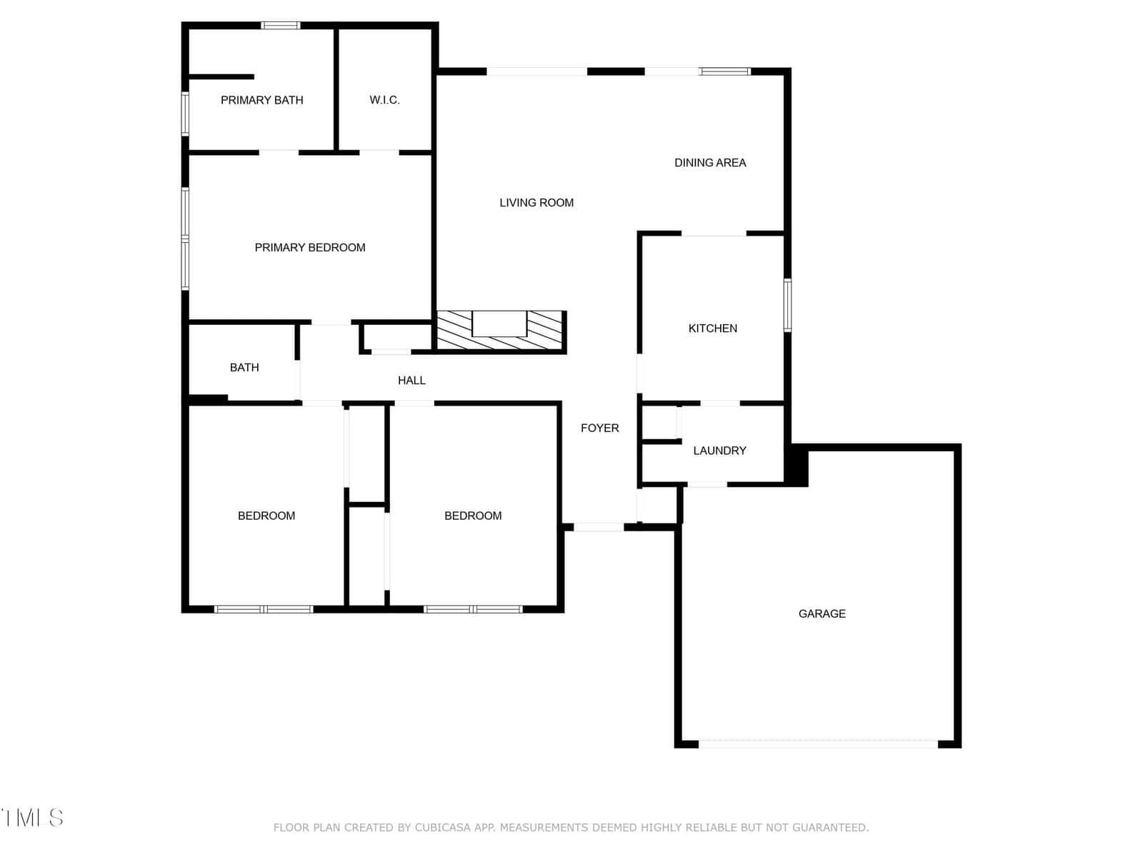Black and white floor plan of a house showing a primary bedroom with bath and walk-in closet, two more bedrooms, a bath, living and dining areas, kitchen, laundry, foyer, hall, and an attached two-car garage.
