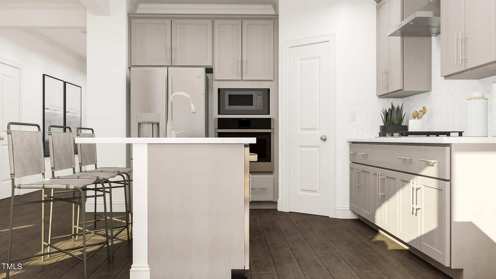 Modern kitchen with light gray cabinets, stainless steel appliances, an island with a sink, and three metal barstools. Dark wood floors contrast with the neutral tones. The space is well-lit with natural and artificial light.