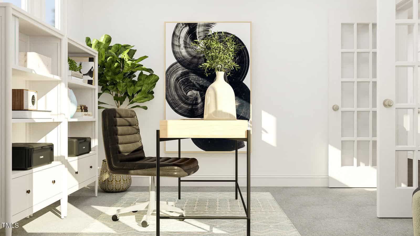 A modern home office with a wooden desk, a tan chair, a black shelving unit, and plants. A large abstract art piece and bright sunlight fill the minimalist, cozy room.