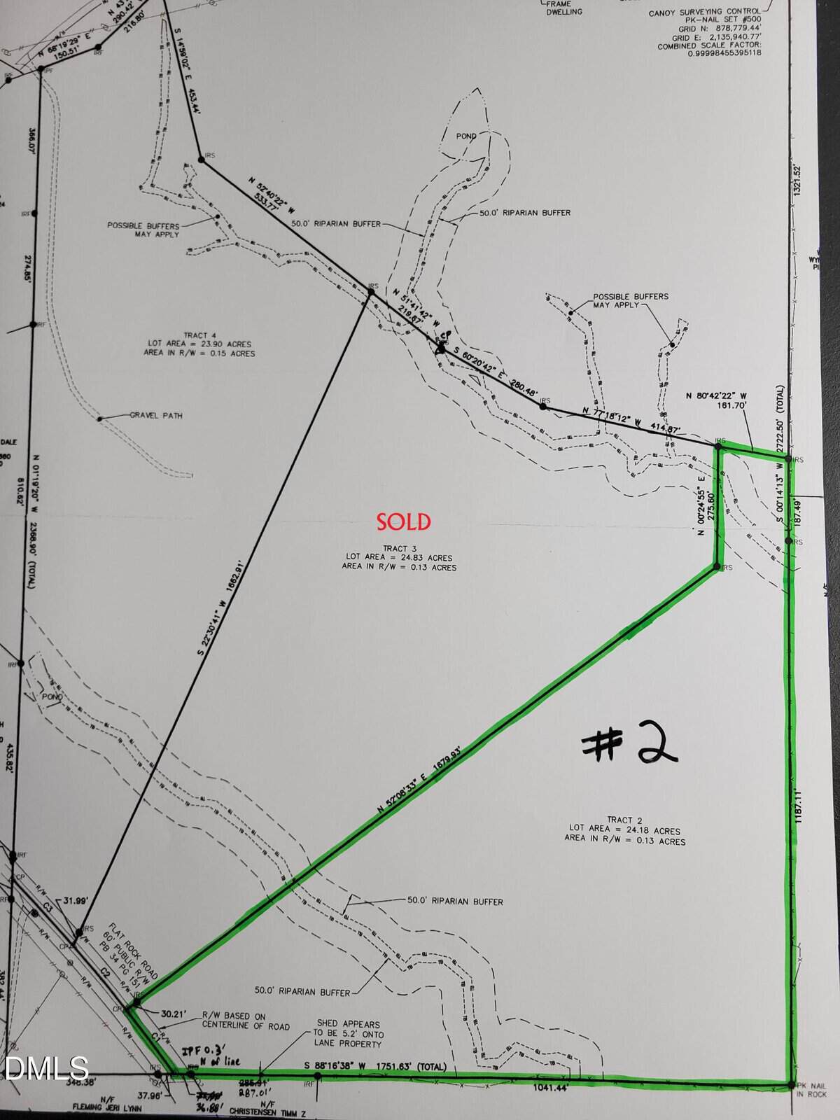 Black and white land survey map with one lot marked “SOLD” in red text and another lot outlined in green and labeled “#2.” Various property boundaries and creeks are indicated.