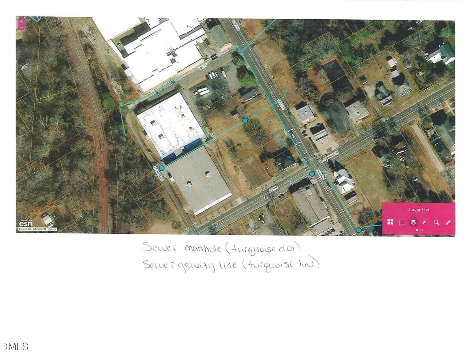 Aerial map showing a neighborhood with outlined properties, streets, and buildings. Turquoise dots and lines indicate sewer manholes and sewer gravity lines. Handwritten notes label the turquoise markings. A pink map legend is visible on the right.