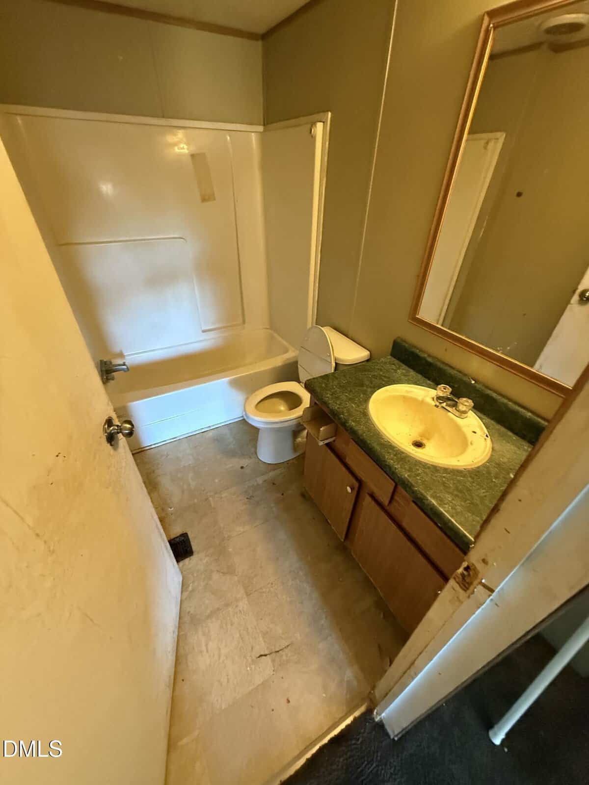A bathroom with a sink toilet and shower.