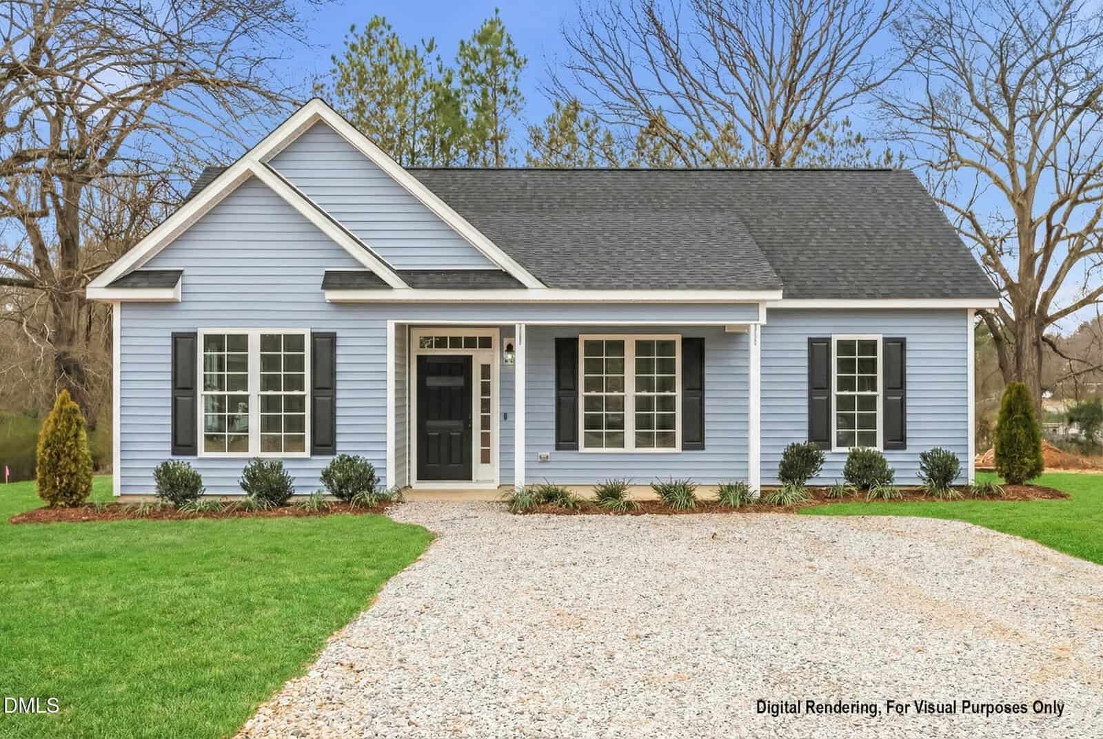 A charming single-story house at 374 Vicksboro Road, Henderson features light blue siding, white trim, black shutters, and a dark gray roof. The front yard boasts green grass, shrubs, a gravel driveway, and mature trees in the background.
