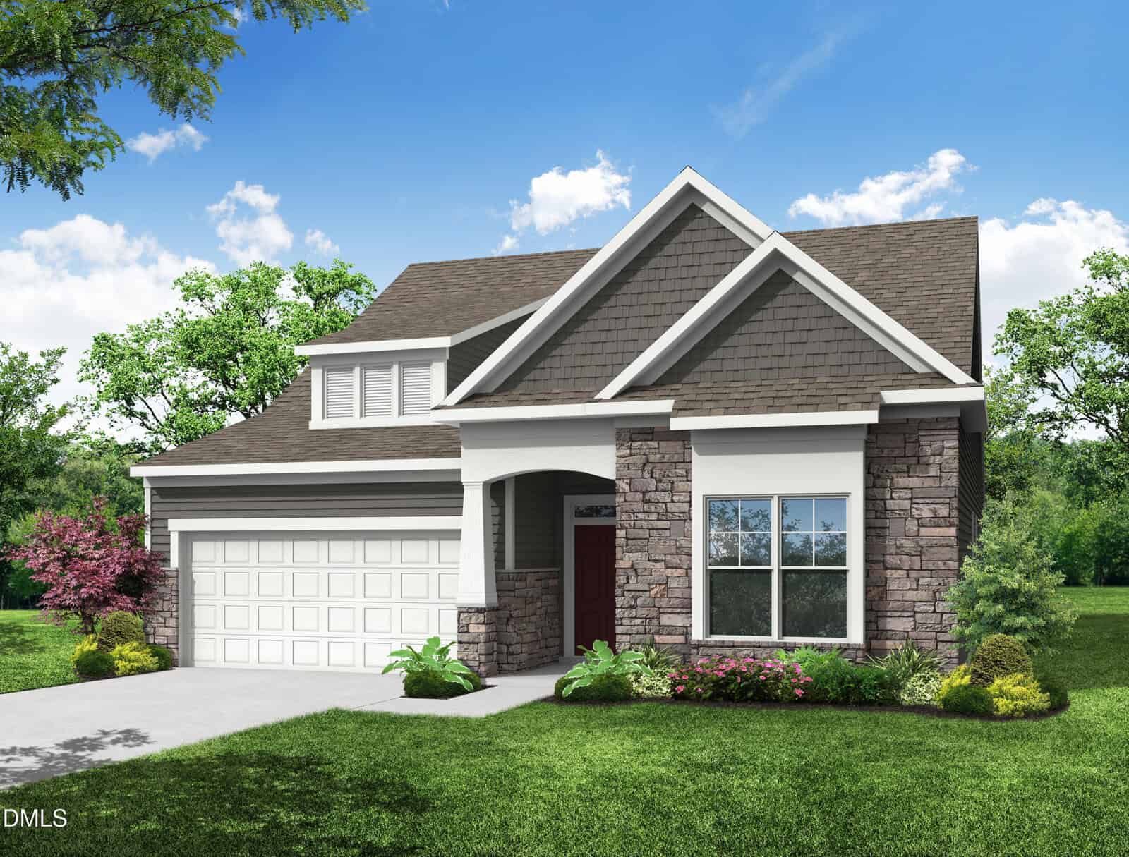 A modern suburban house with a two-car garage, stone and siding exterior, gabled roof, large front window, landscaped yard, and trees in the background under a blue sky with scattered clouds.