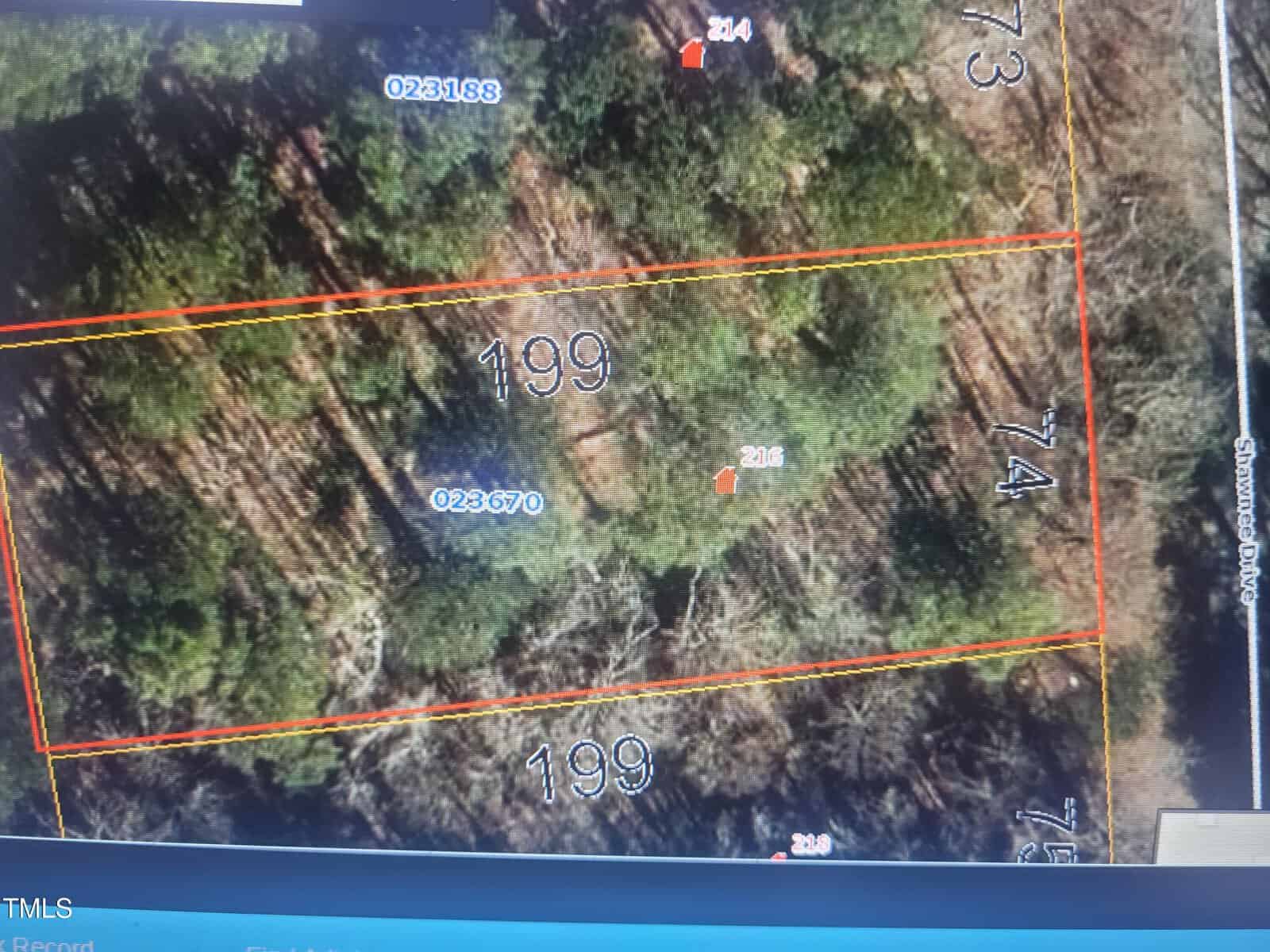 Aerial map image showing a rectangular wooded lot labeled 199, outlined in red, with parcel numbers, lot lines, and some trees visible. The street Sampson Road is labeled on the right side of the image.