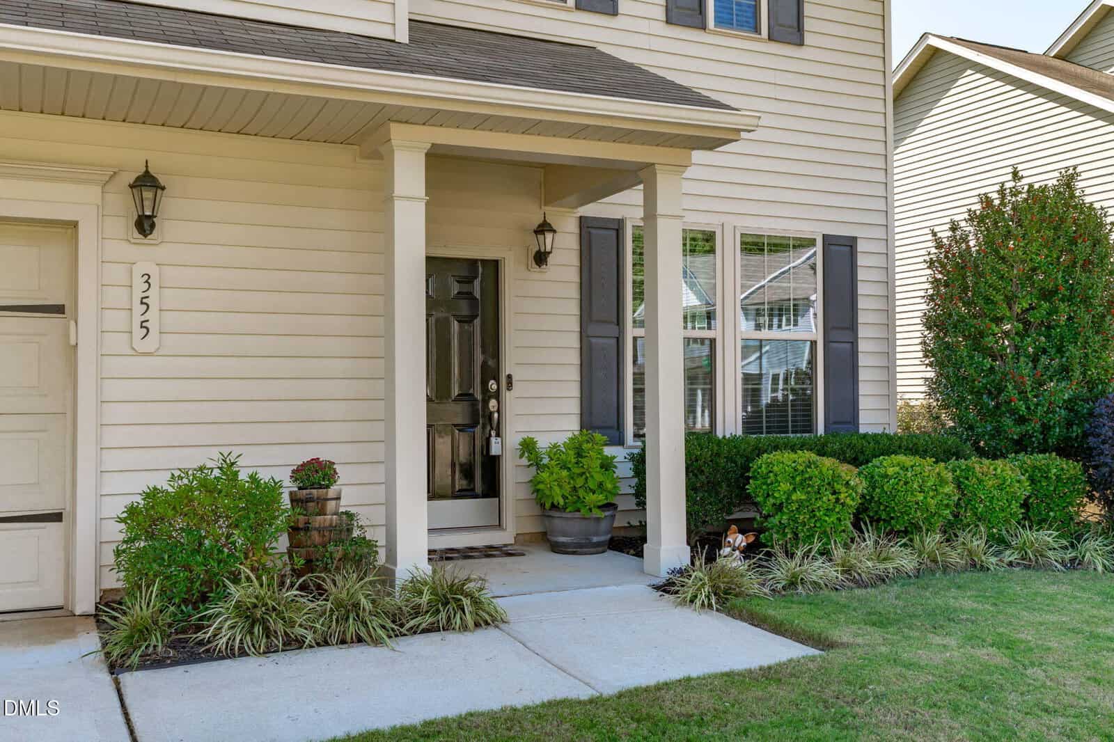 A house with a porch and a door.