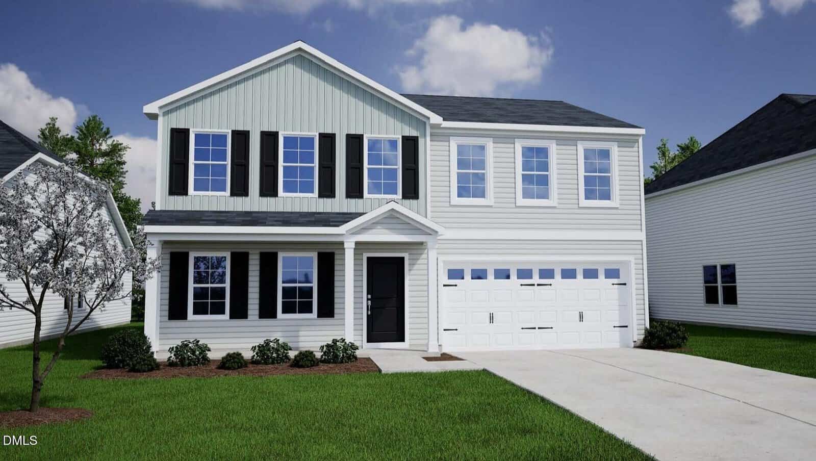 Two-story white house with black shutters, a covered front porch, and a double garage located at 70 Buckthorn Drive, Youngsville. The home features a concrete driveway, green lawn, small shrubs, and a tree on the left, with neighboring houses on both sides under a partly cloudy sky.
