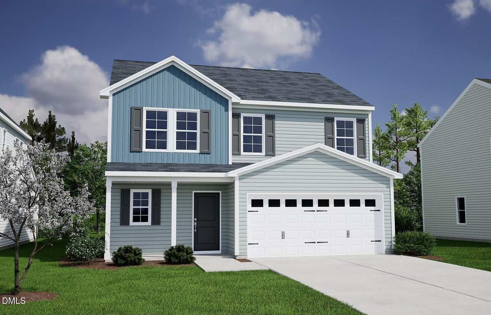 Charming two-story suburban house in Youngsville, located at 120 Buckthorn Drive, featuring blue and white siding, gray shingles, a double garage, covered entry, shuttered windows, and a driveway. The front yard has a small tree, shrubs, and green grass. Sky is partly cloudy.