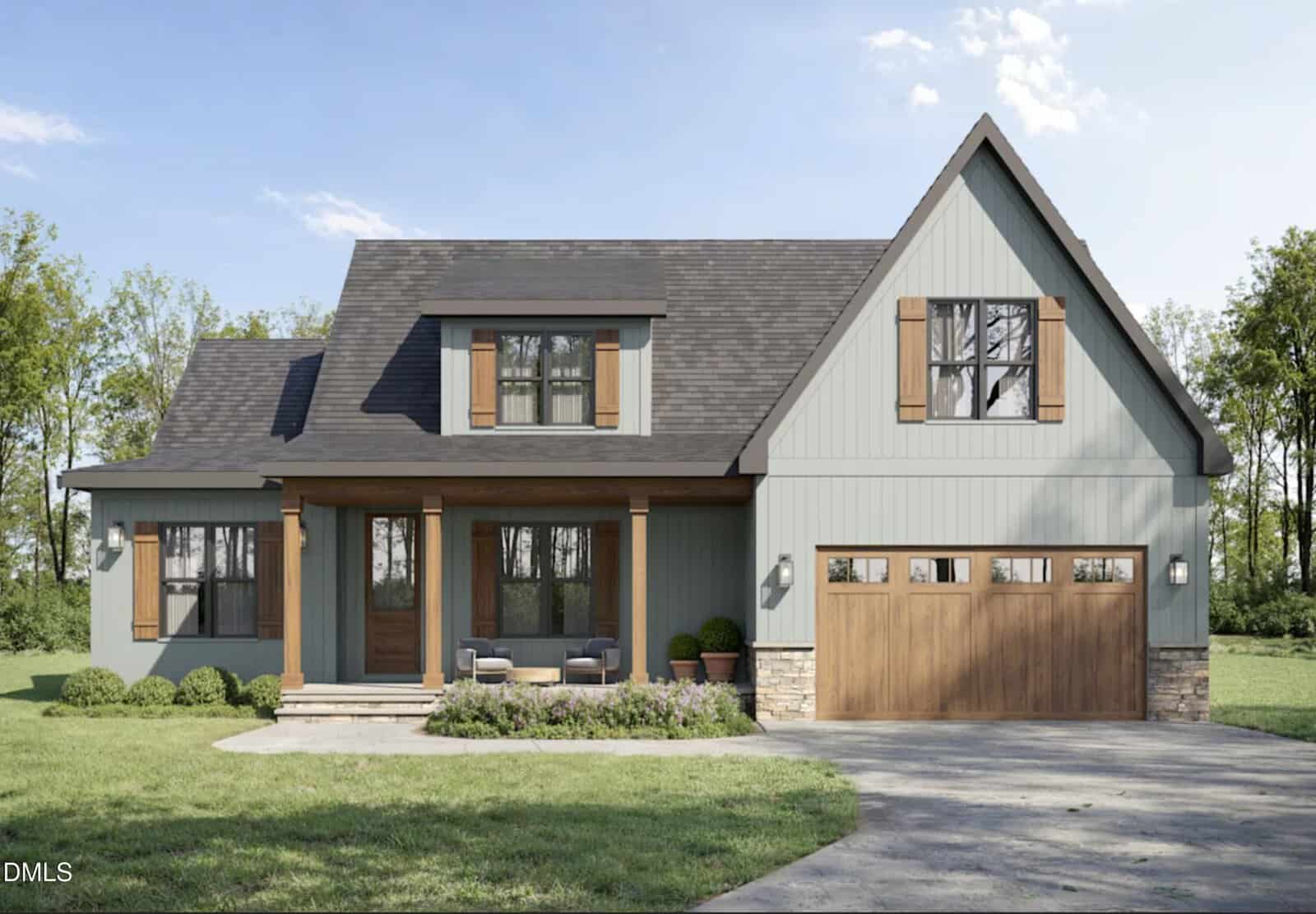 A modern farmhouse with gray siding, wooden shutters, and a gabled roof. There is a front porch with two chairs, a two-car garage with wooden doors, and a landscaped front yard with green grass and shrubs.