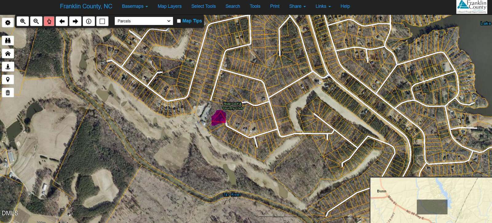 A digital map of Franklin County, NC, showing property parcel boundaries, roads, wooded areas, a river, and a highlighted parcel in purple at the center, with a small inset map in the bottom right corner.