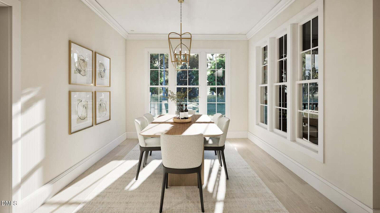 Bright dining room with a rectangular wood table, six upholstered chairs, large windows letting in sunlight, four framed artworks on one wall, a light-colored rug, and a modern gold chandelier overhead.