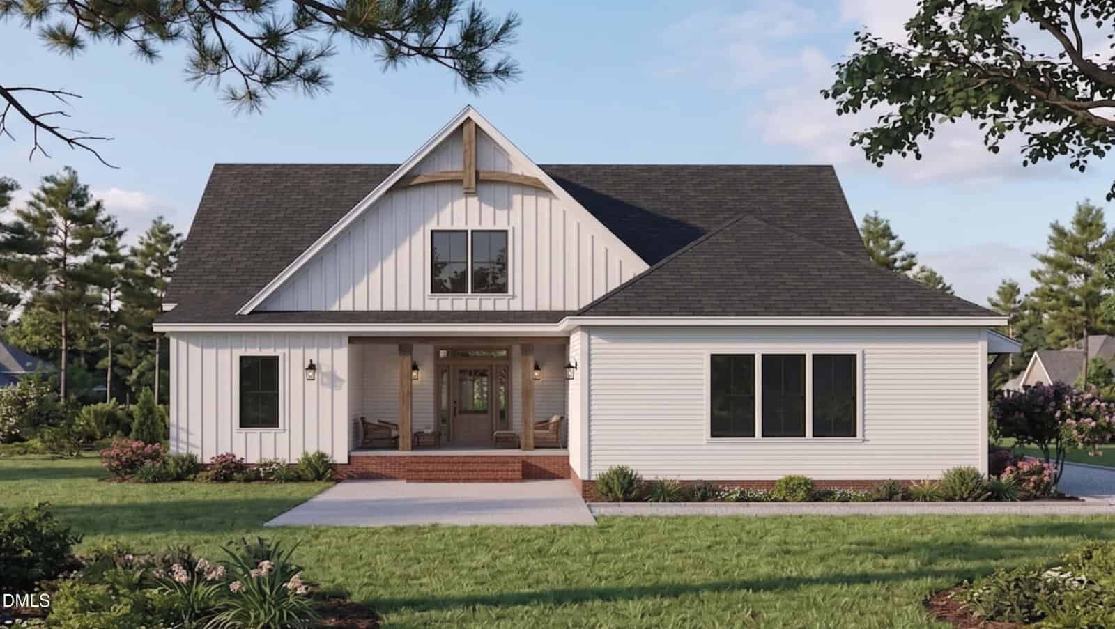 A modern white farmhouse with dark gabled roof, vertical siding, large windows, and a covered front porch with brick steps, surrounded by a manicured lawn and lush landscaping on a sunny day.